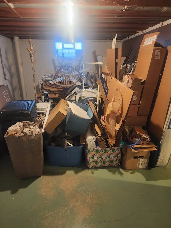 Roll-off dumpster container at job site for Yard Waste Dumpster Rental in Pierre